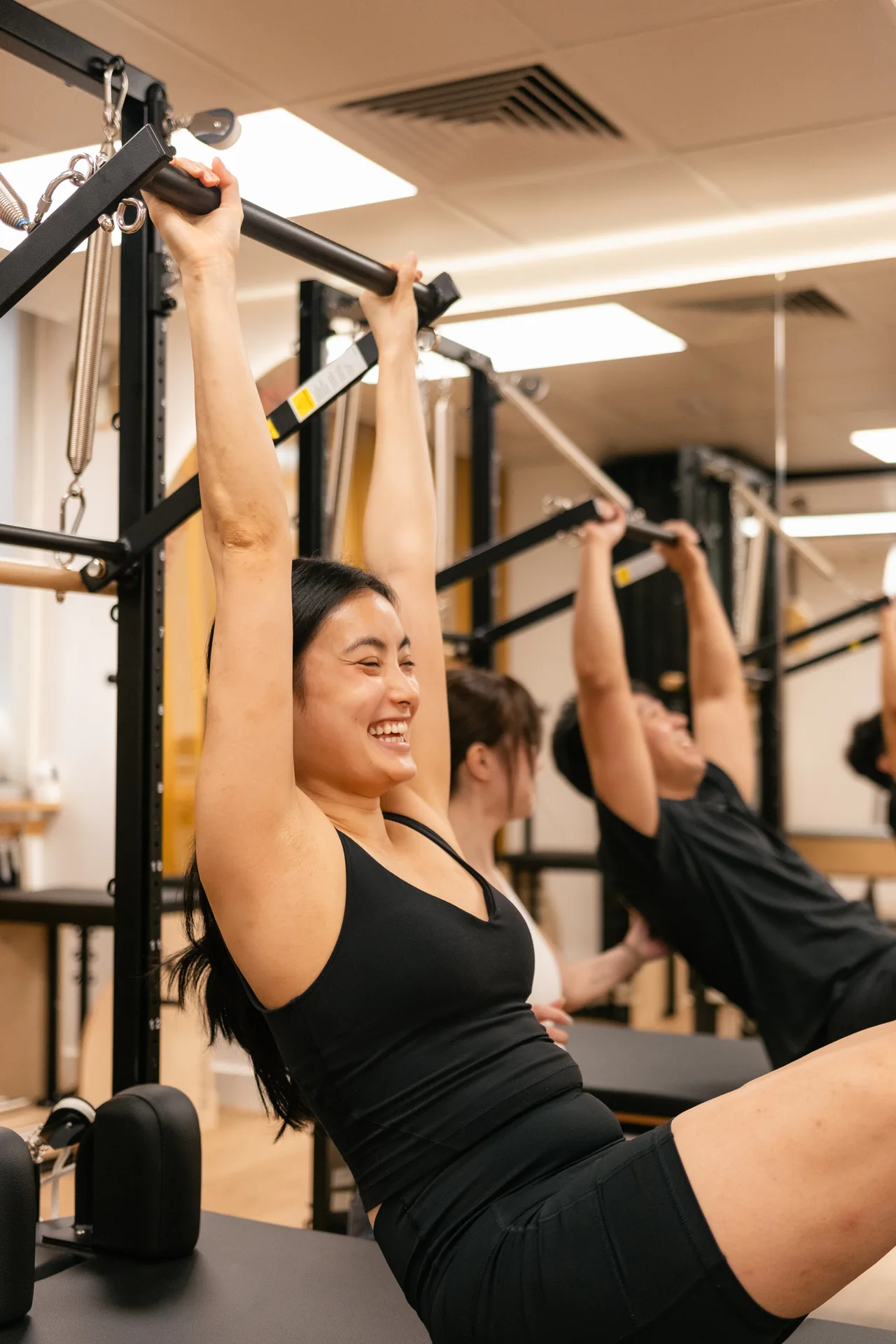 core-community-pilates-tower-seated-bar-exercise-mgk-0029